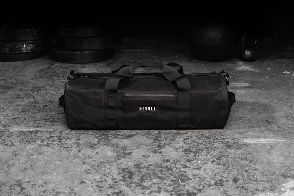 NOBULL Waxed Canvas Traditional Duffle Backpacks - Black - Ireland (8296FWNYK)